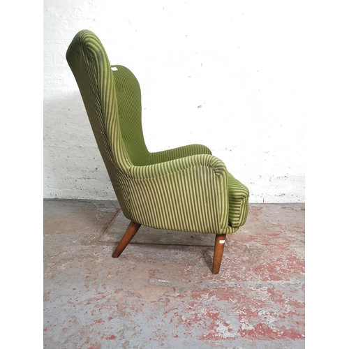 394 - A mid 20th century Ernest Race DA1 green upholstered lounge chair - approx. 98cm high x 78cm wide x ... 