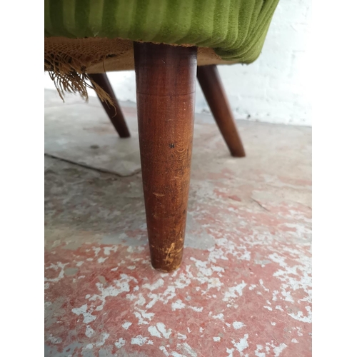 394 - A mid 20th century Ernest Race DA1 green upholstered lounge chair - approx. 98cm high x 78cm wide x ... 