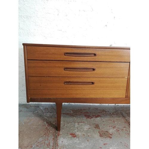 399 - A Nathan teak sideboard with three drawers and two cupboard doors - approx. 75cm high x 185cm wide x... 