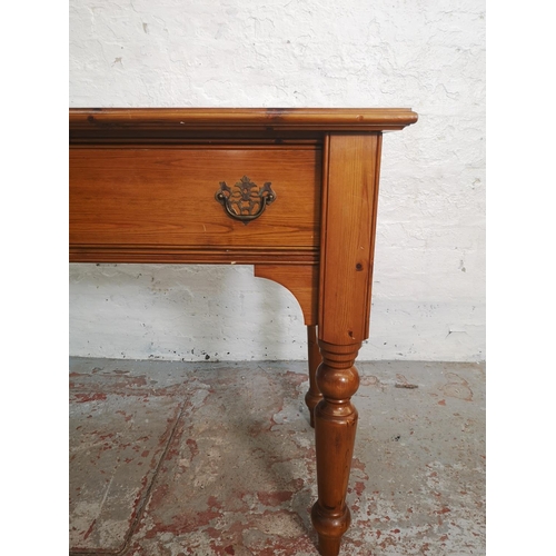 404 - A Country Furniture Workshop pine two drawer console table - approx. 81cm high x 141cm wide x 53cm d... 