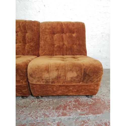 416 - A pair of mid 20th century burnt orange upholstered lounge chairs - approx. 84cm high x 68cm wide x ... 