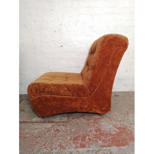 416 - A pair of mid 20th century burnt orange upholstered lounge chairs - approx. 84cm high x 68cm wide x ... 