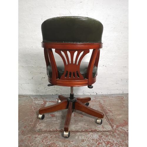 433 - A mahogany and green leather Captain's swivel office desk chair