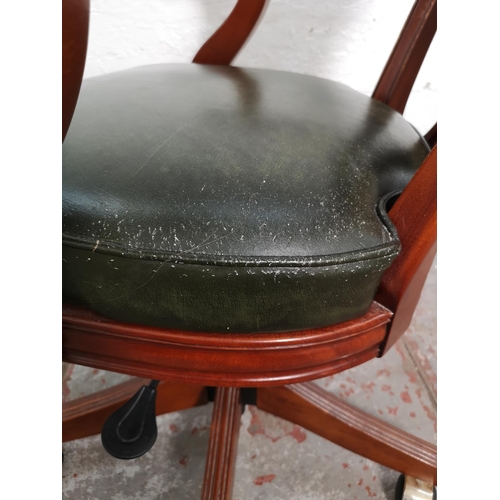 433 - A mahogany and green leather Captain's swivel office desk chair