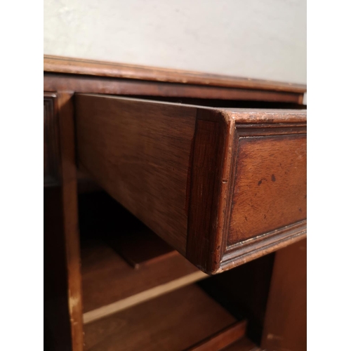 434 - A 19th century style mahogany pedestal desk with five drawers, green leather insert and brass swan n... 