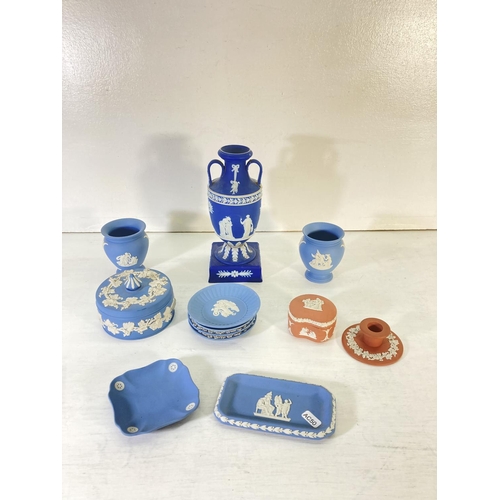 44 - A collection of Wedgwood Jasperware to include terracotta trinket box and candlestick, 19th century ... 