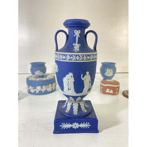 44 - A collection of Wedgwood Jasperware to include terracotta trinket box and candlestick, 19th century ... 