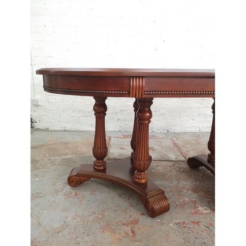 445 - A 19th century style mahogany twin pedestal oval extending dining table - approx. 107cm wide x 170cm... 