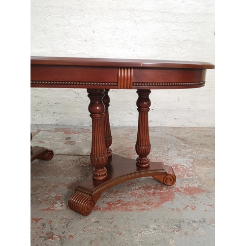 445 - A 19th century style mahogany twin pedestal oval extending dining table - approx. 107cm wide x 170cm... 