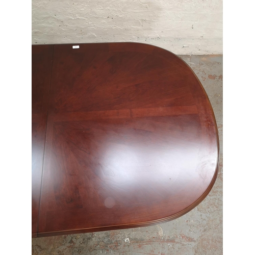 445 - A 19th century style mahogany twin pedestal oval extending dining table - approx. 107cm wide x 170cm... 