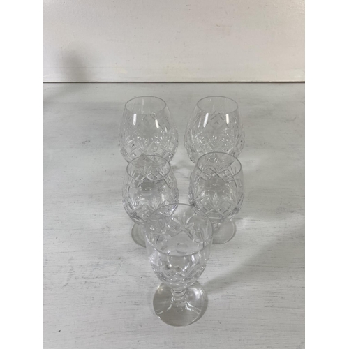45 - A collection of assorted glassware to include Waterford Crystal 25cm ships decanter, Waterford Cryst... 
