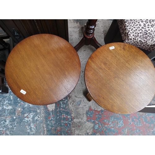 454A - Eleven pieces of occasional furniture to include oak nest of three tables, two oak circular top side... 