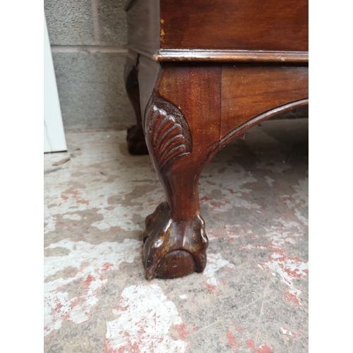 461 - A Georgian style mahogany bow fronted sideboard with carved acanthus leaf gallery back, two outer cu... 