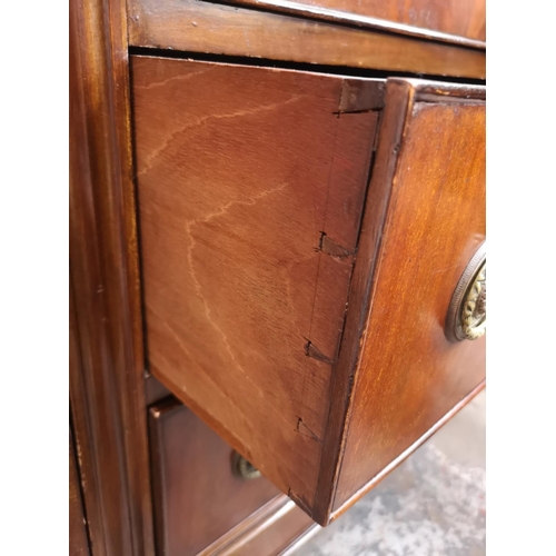 461 - A Georgian style mahogany bow fronted sideboard with carved acanthus leaf gallery back, two outer cu... 