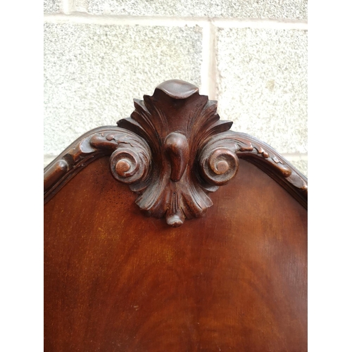 461 - A Georgian style mahogany bow fronted sideboard with carved acanthus leaf gallery back, two outer cu... 