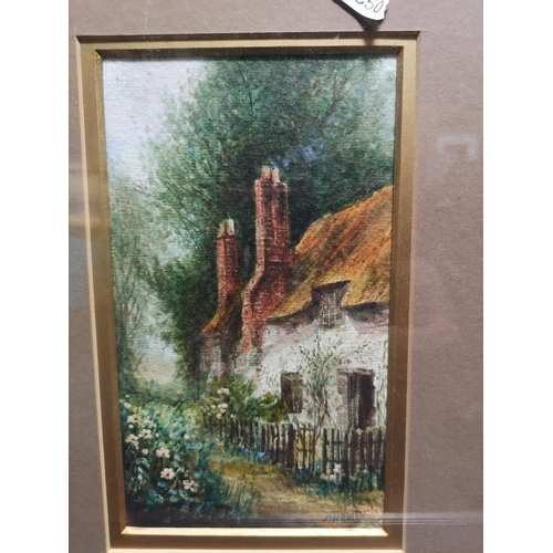 477 - Two framed cottage scene watercolours by J. H. Thorley - approx. 39cm high x 26cm wide