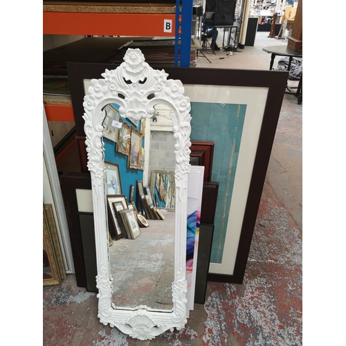 488 - Nine various pictures and mirrors to include French style white painted framed wall mirror, three mo... 