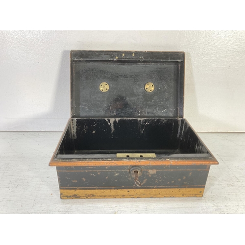 348 - An early/mid 20th century black metal cash money box with original key - approx. 11cm high x 25cm wi... 