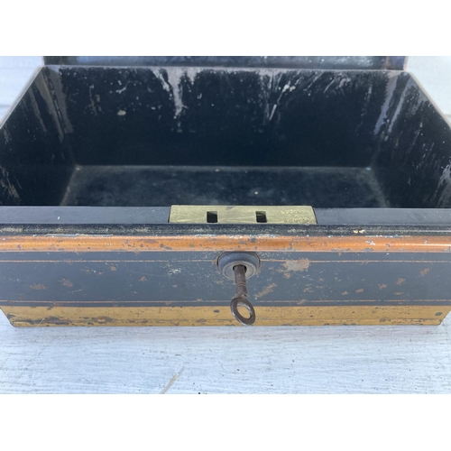 348 - An early/mid 20th century black metal cash money box with original key - approx. 11cm high x 25cm wi... 