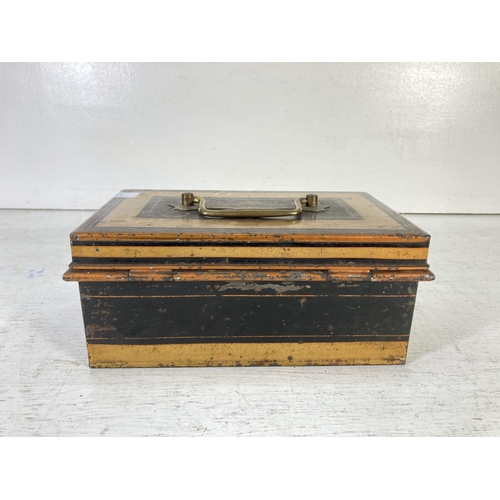 348 - An early/mid 20th century black metal cash money box with original key - approx. 11cm high x 25cm wi... 