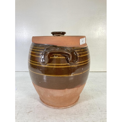 350 - A 19th century terracotta and brown glazed confit pot with two handles and original lid - approx. 13... 