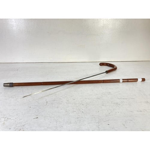 352A - A Victorian mahogany faux bamboo sword stick - approx. 87cm high