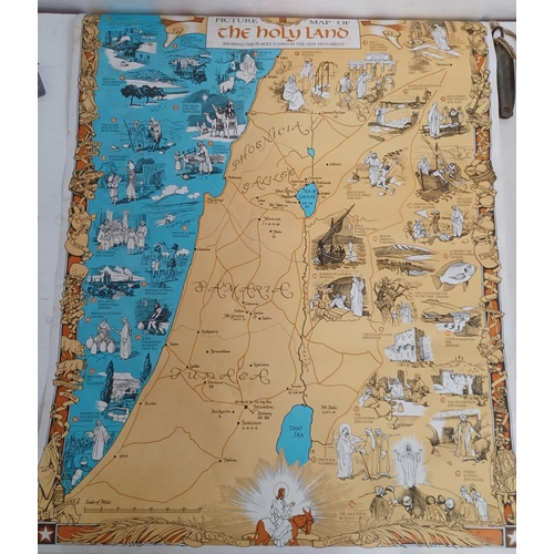 538 - A collection of rolled posters to include 'Lovely Day for a Guinness', Picture Map of the Holy Land,... 