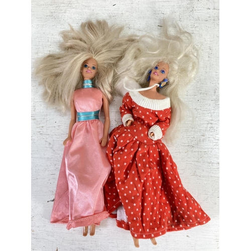 251D - A collection of Mattel Barbie and Ken dolls