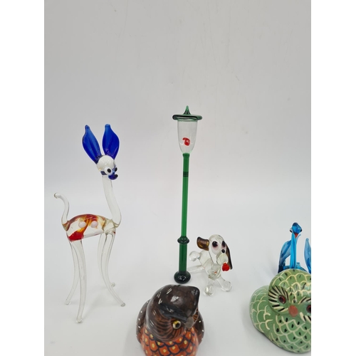 36 - A collection of ceramic and glass animal figurines to include Swarovski crystal, Venetian glass, han... 