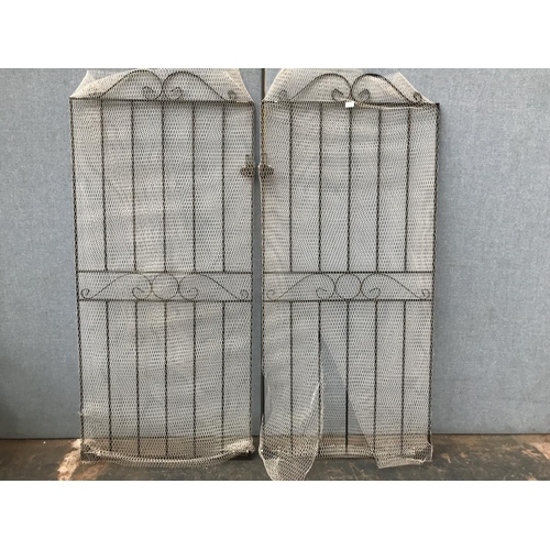 634 - Two wrought iron garden gates - approx. 182cm high x 81cm wide