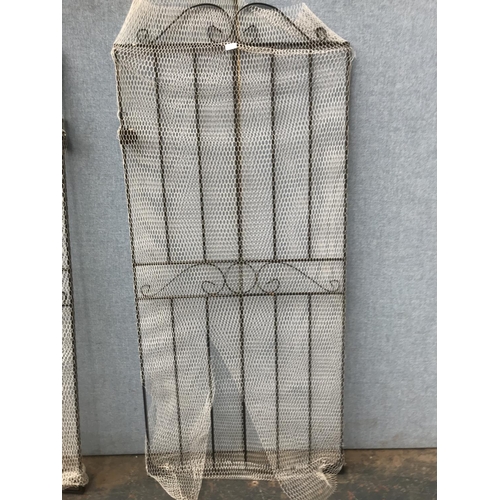 634 - Two wrought iron garden gates - approx. 182cm high x 81cm wide