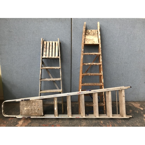 632 - Three step ladders, one aluminium and two wooden