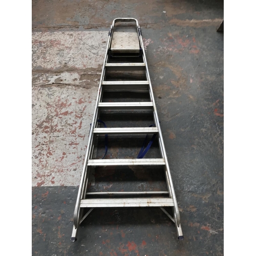 632 - Three step ladders, one aluminium and two wooden