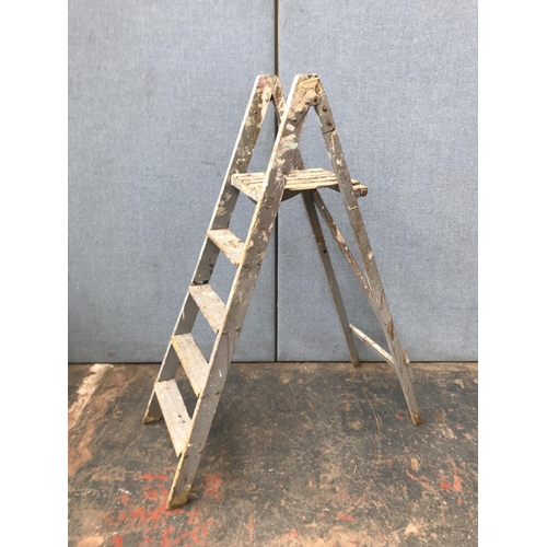 632 - Three step ladders, one aluminium and two wooden