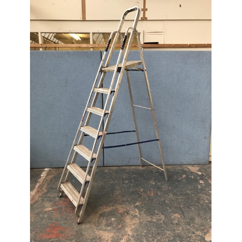 632 - Three step ladders, one aluminium and two wooden