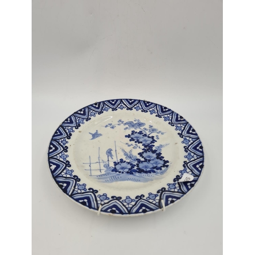 31 - Three pieces of Oriental porcelain, two 19th century plates, blue and white approx. 22cm diameter an... 