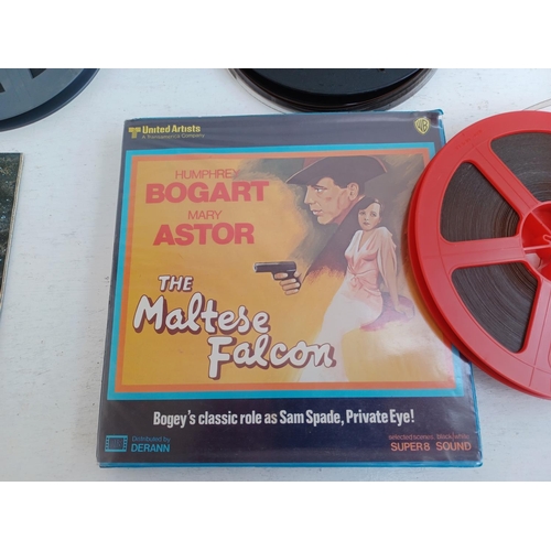 546 - Two boxed Super8 cine films, one two reel The Maltese Falcon Starring Humphrey Bogart and Mary Astor... 