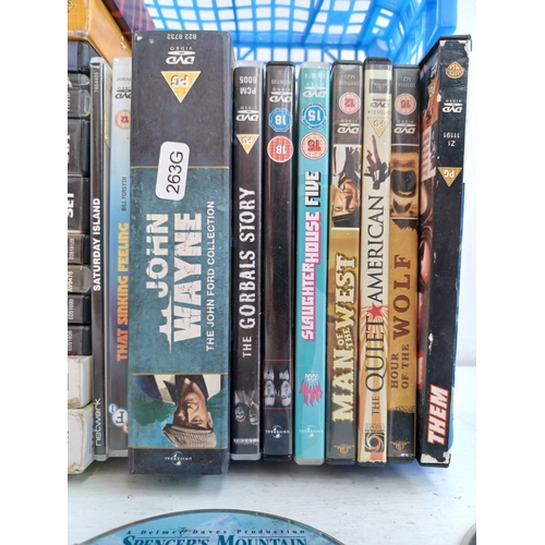 550 - Two boxes containing a collection of DVDs to include John Wayne The John Ford Collection, The Muppet... 