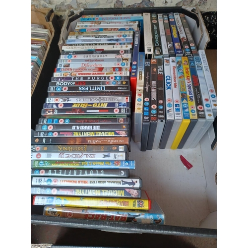 552 - Five boxes, four containing a large collection of DVDs to include Far From Heaven, Green Street, The... 