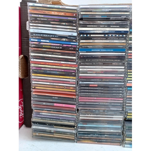 554 - Two boxes containing a collection of CD singles to include Willy Mason, The Magic Numbers, Manic Str... 