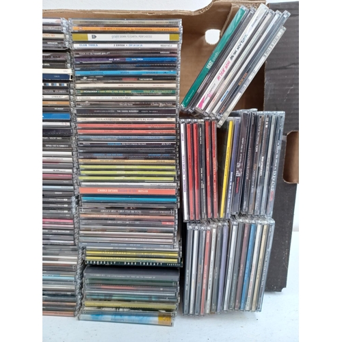 554 - Two boxes containing a collection of CD singles to include Willy Mason, The Magic Numbers, Manic Str... 