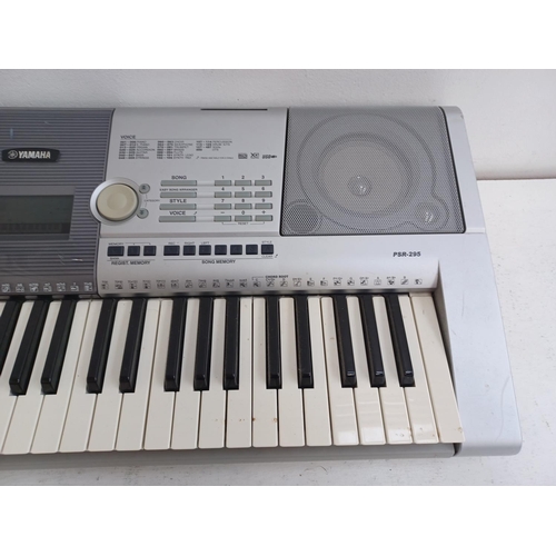 565 - A Yamaha PSR-295 electronic home keyboard