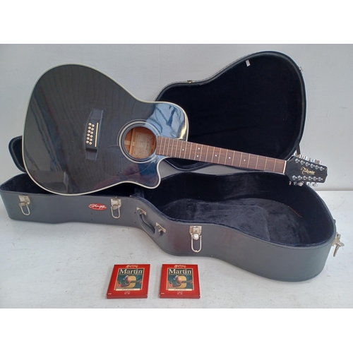 569 - A hard cased black gloss Takamine EG-335BC twelve string electro acoustic guitar with two sealed set... 