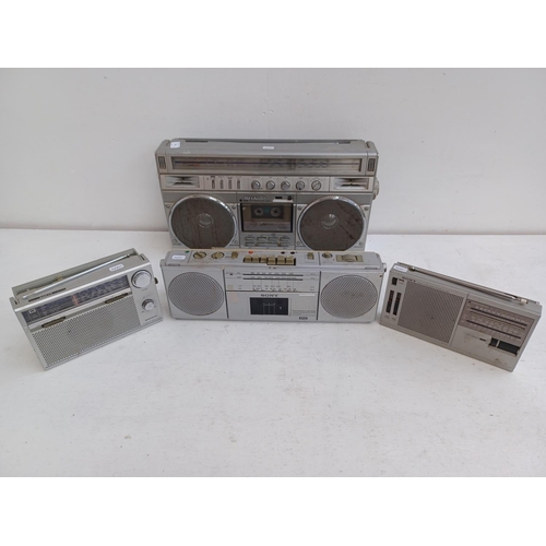 578 - Four 4-band radios, one Sharp GF-8989 with Dolby cassette recorder, one Sony ICF-1200, one Sanyo RP8... 