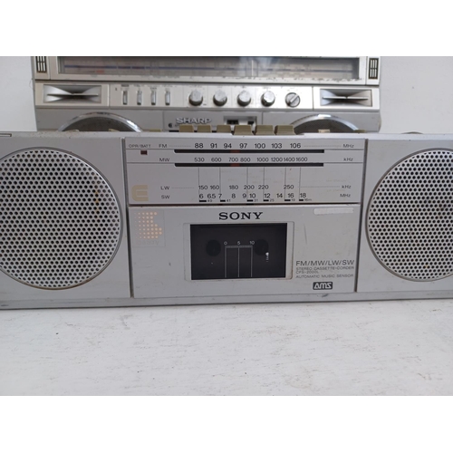 578 - Four 4-band radios, one Sharp GF-8989 with Dolby cassette recorder, one Sony ICF-1200, one Sanyo RP8... 