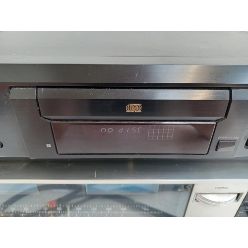 580 - Two items of hi-fi, one JVC JR-S200L stereo receiver with JVC RCA cable and one Sony CDP-XE330 CD pl... 