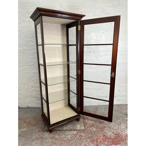 429 - A 19th century style simulated rosewood and glass display cabinet with single door and four internal... 