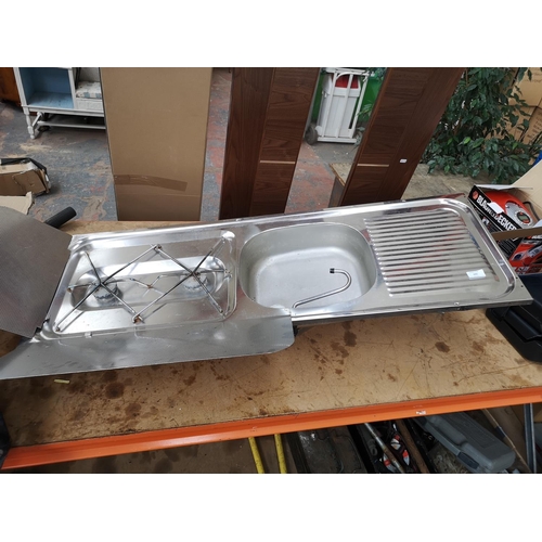 640 - An aluminium campervan stove and sink - approx. 116cm wide x 41cm deep