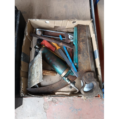 642 - Three boxes containing various tools to include cased Exakt EC310-N saw, hand saw, spirit level, scr... 