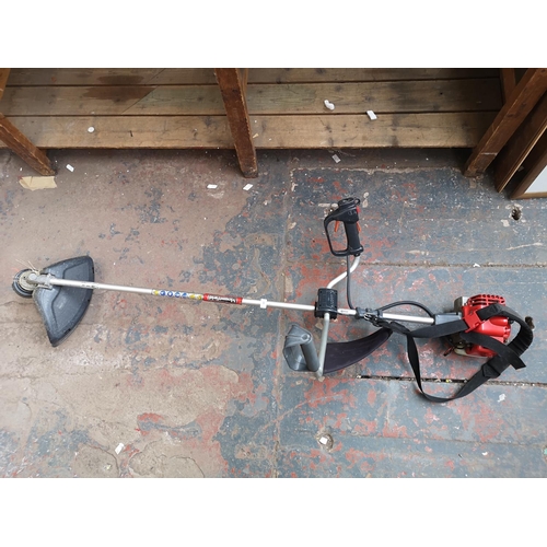 649 - A Mountfield MB28D petrol strimmer